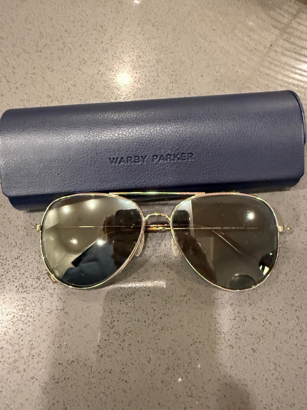 Warby Parker Aviator style sunglasses